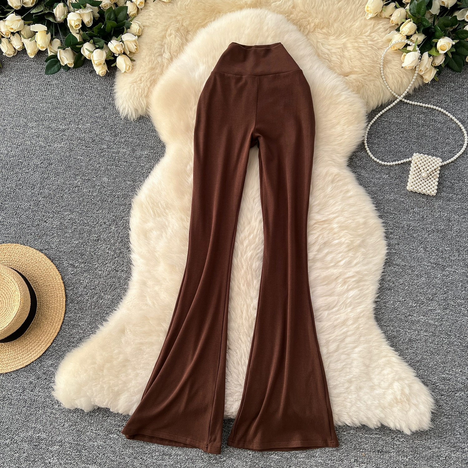 Versatile and slightly flared trousers - Image 11