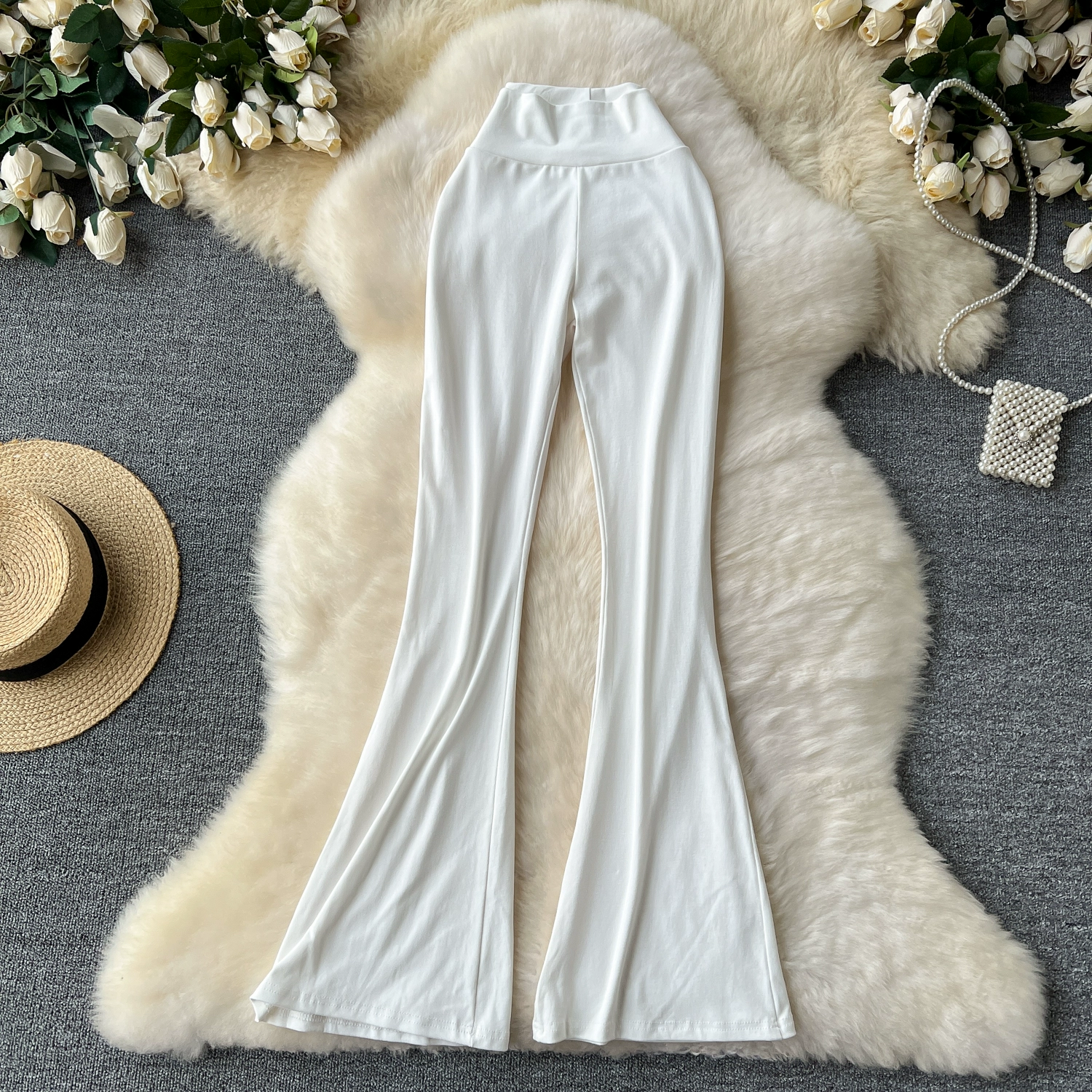 Versatile and slightly flared trousers - Image 8