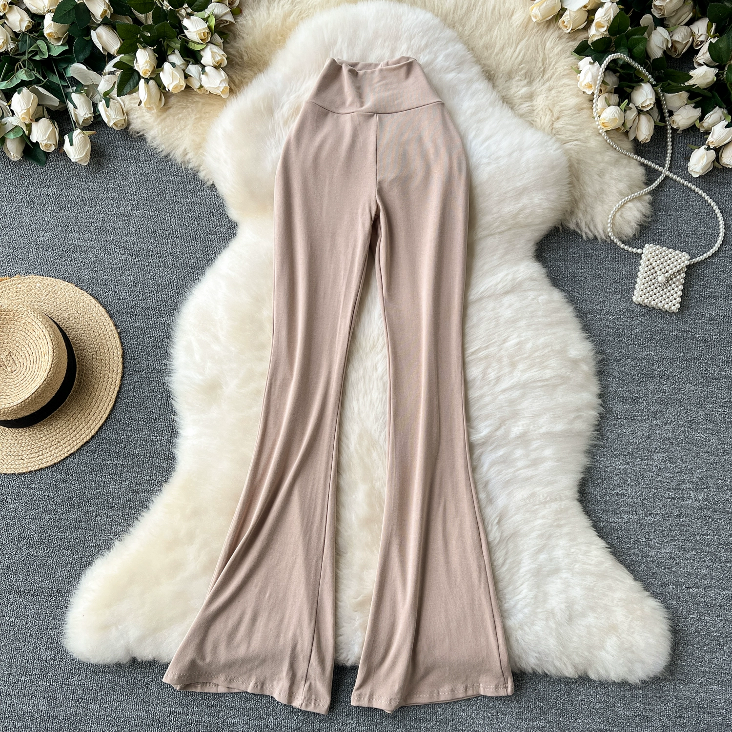 Versatile and slightly flared trousers - Image 7