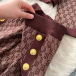 European-style chic and sophisticated two-piece set: round neck long-sleeved knit top with metal buckle and high-waisted wide-leg pants. - Image 5