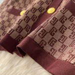 European-style chic and sophisticated two-piece set: round neck long-sleeved knit top with metal buckle and high-waisted wide-leg pants. - Image 8